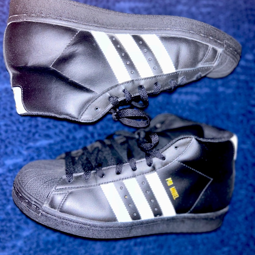 Black Hightop Adidas with White Stripes